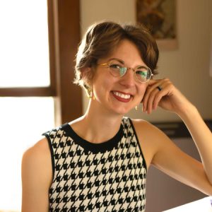 Portrait of Chloe Burgett. The link takes yout to browse what events she'll be attending at OPL